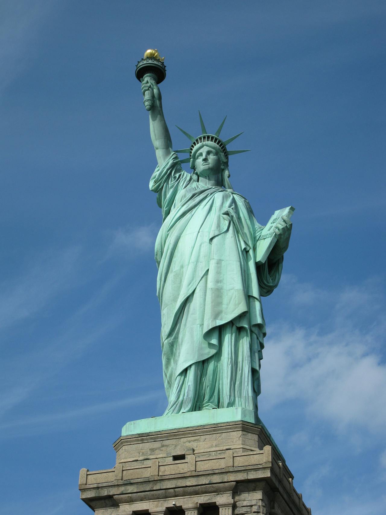 iconic statue of liberty in new york for immigration journey